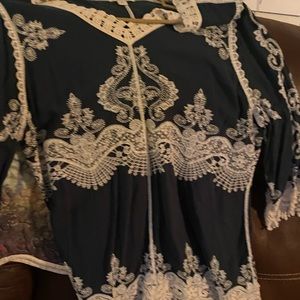 Very pretty green blouse with ivory embroidery size xl